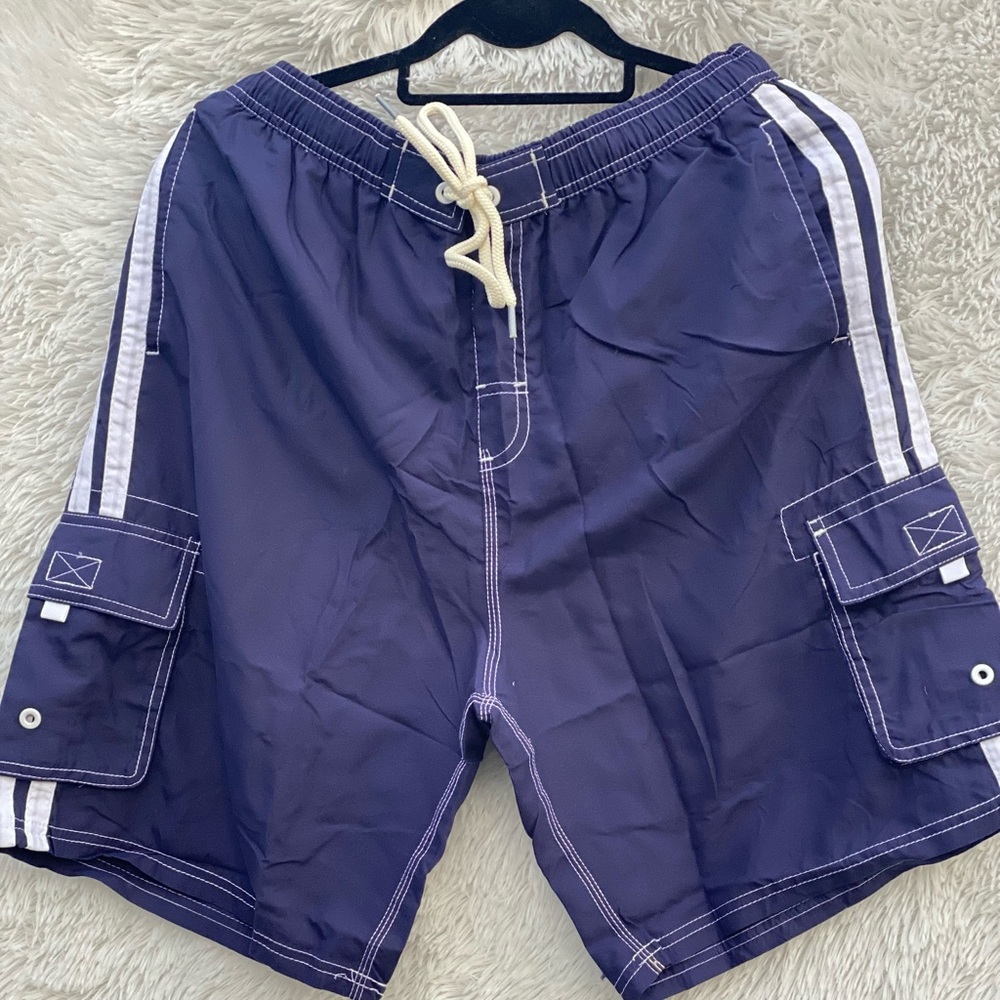 New- Men Swim Trunks in blue color size Medium with front pockets